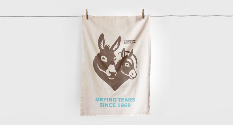 The Donkey Sanctuary product and retail charity charity retail branding tea towel 353fe568217a4ecd8f2727f818d6534e